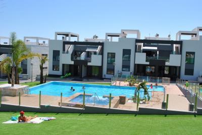 Jarðhæð íbúð í Oasis Beach Punta Prima 8 Nº 039 in España Casas